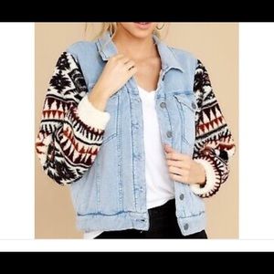 Denim jacket w/ southwestern patterned sleeve